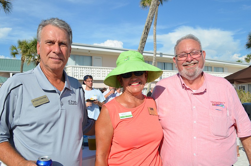 Joel Trippiedi, G.Fried Flooring, Allie Hueter, Building Connections and Jack Dean of Montgomery's Carpets Plus