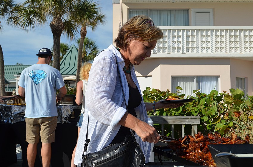 Olivia Willis of Island Directory tries some Tennessee style ribs.