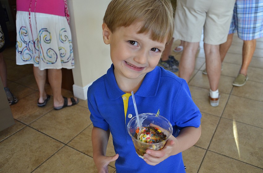 Arian Buchter gets ice cream with his grandparents, Maureen and Jack.
