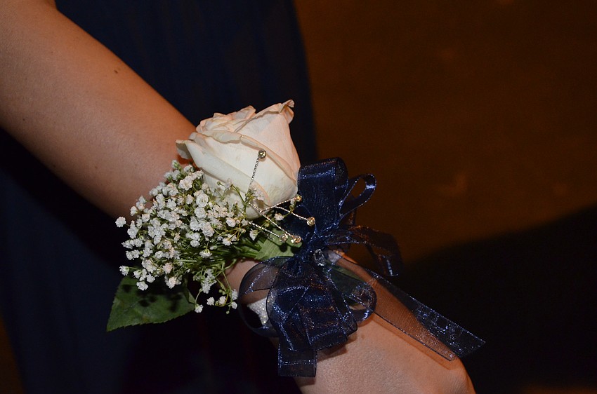 Morgan Kirlangitis shows off her corsage.