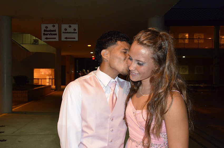 William Gonzalez gives his girlfriend Kate Walker a kiss on the cheek.