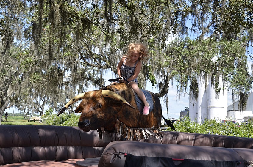 Ella Mowry of Sarasota takes a spin on a mechanic bill.