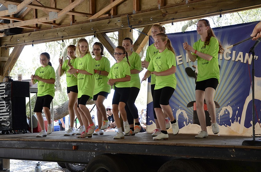 The Clogging 4-H Club entertains a crowd with their routines.