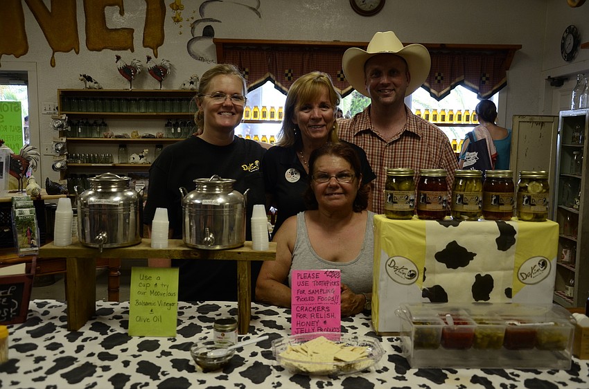 Charlotte Petrovich, Charlene Pinkel, Chris Prahm and Peter Petrovich help out in the store.