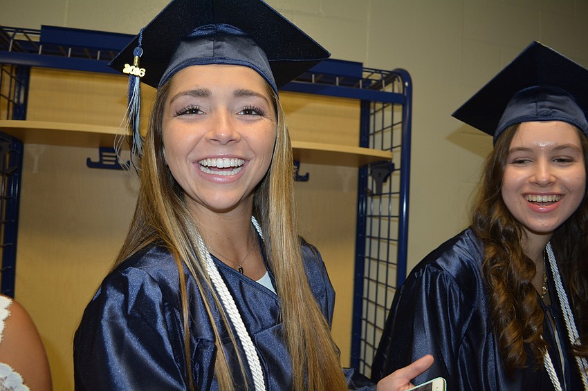 Jordan Bruder smiles after taking a selfie.