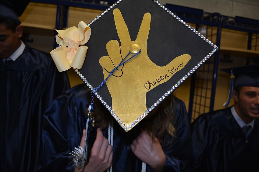 Jackie Olson put a bow on her hat because she grew up wearing bows. She will attend Vanderbilt.