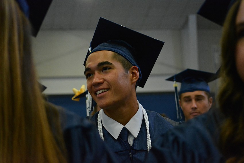 Owen Han smiles as the ceremony begins.