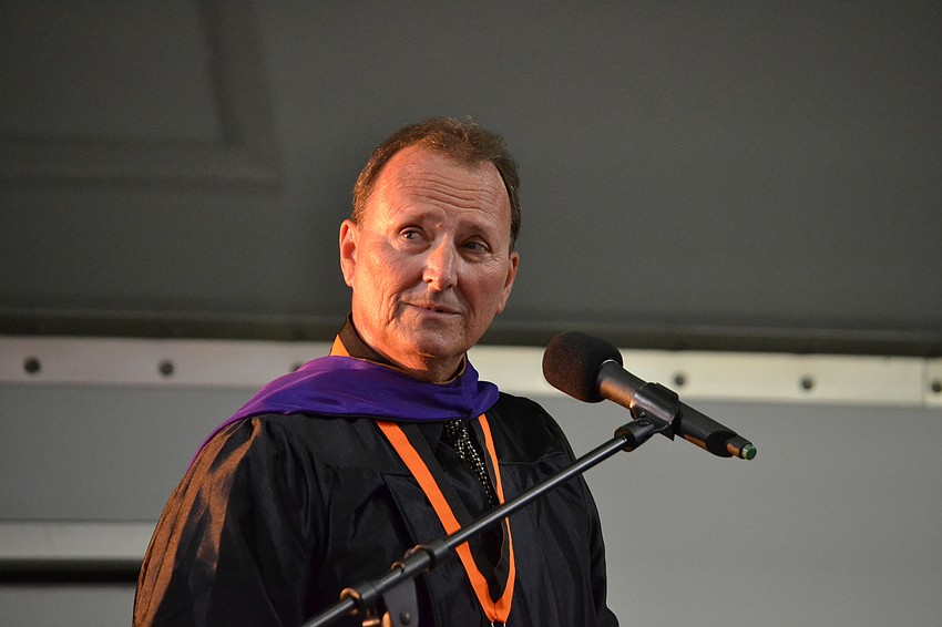 Sarasota High School Principal Jeff Hradek welcomes guests and graduates.