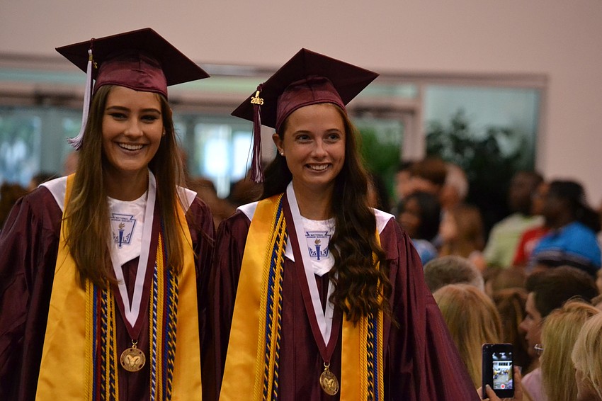 Isabelle Ball and Camille Armington in the procession for the Riverview High School commencement ceremony.