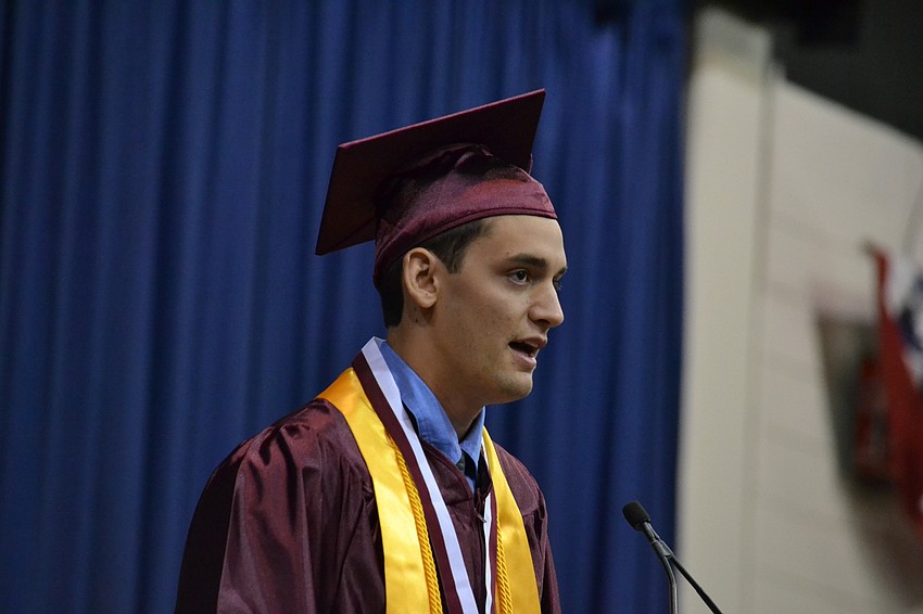 Senior class treasurer Matthew McDuffie quotes rapper Drake in his commencement speech.
