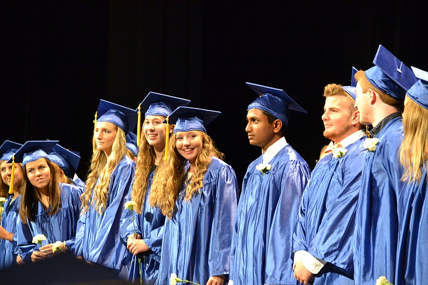 Members of the Pine View Chorale lead the pledge of allegiance.