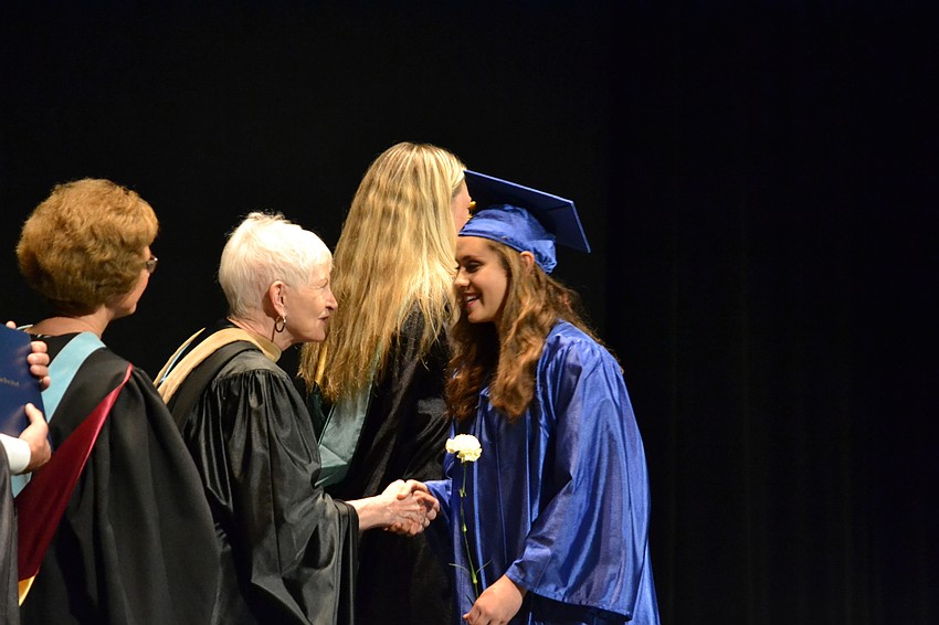 Sophia Belilovskiy receives her diploma.