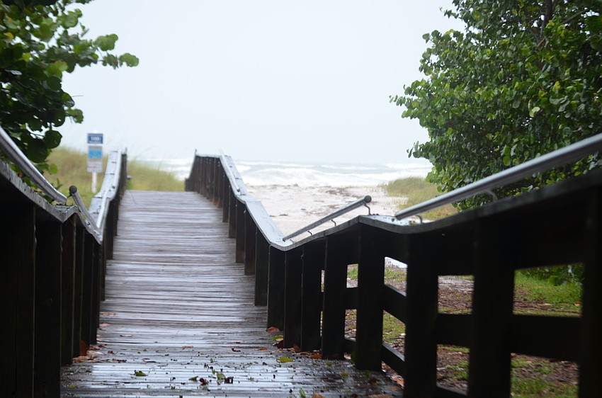 The north end beach access was bare during the storm.