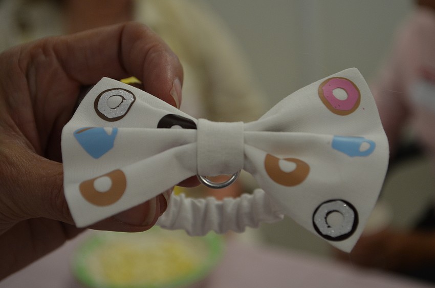 All of the cats in attendance received a goodie bag that included bow ties with doughnuts on them.