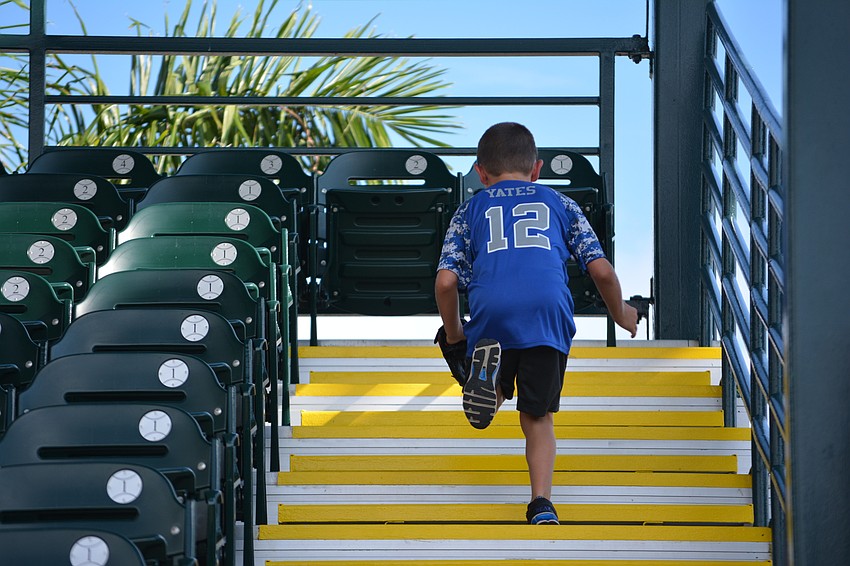 Who cares about baseball when you can run the stadium steps like Cameron Yates is doing?
