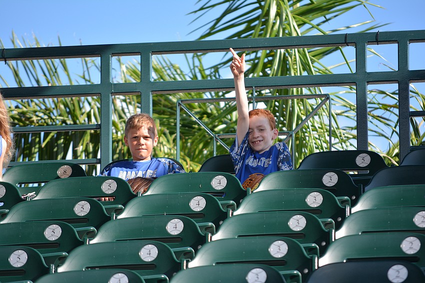 Jaxson Withers and Parker Hullinger have great seats even though they are in the last row.