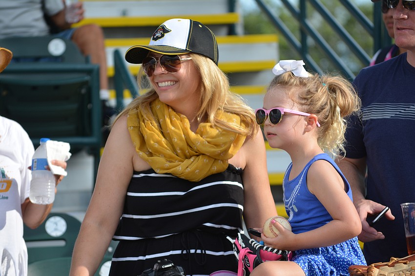 Denise West and her 4-year-old daughter, Kylie, couldn't participate on the field, but they had a great time watching Kayden West.