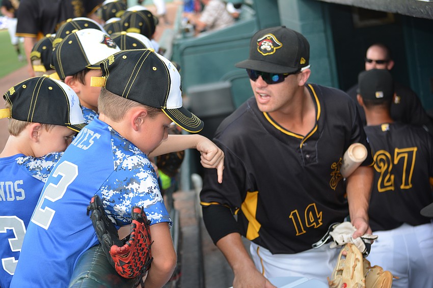 Marauders infielder Kevin Kramer spends time with the Manatee All-Stars just before taking the field against the Tampa Yankees.