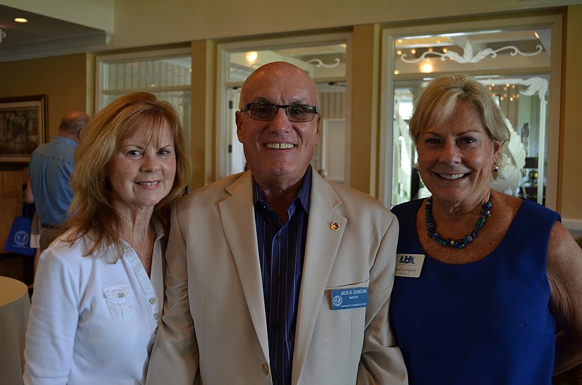 Mayor Jack Duncan, with his wife Debbie and Longboat Key Chamber of Commerce President Gail Loefgren arrive at the 14th annual hurricane seminar.