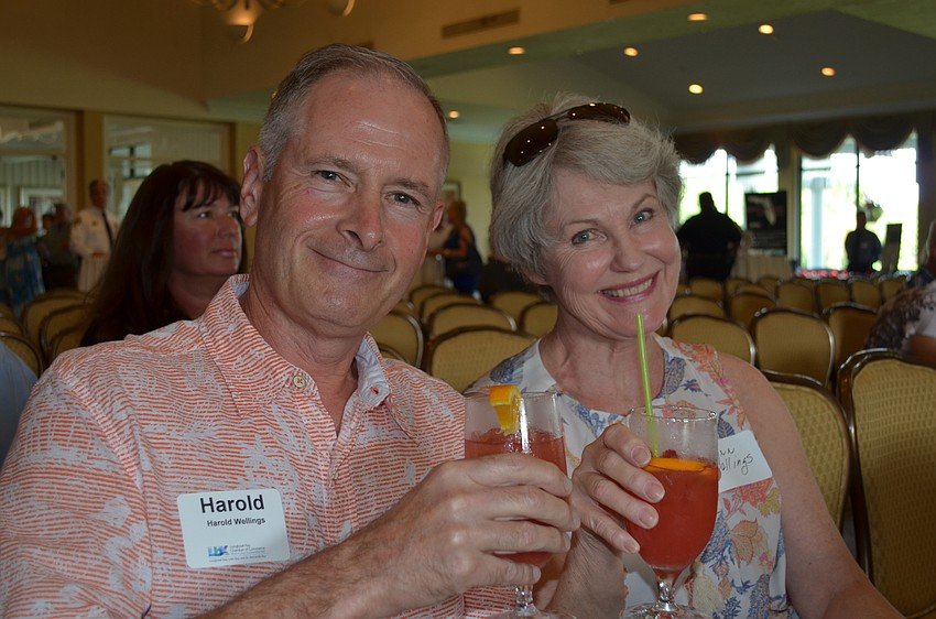 Harold and Lynn Wellings enjoy their virgin hurricanes before the disaster preparedness seminar.