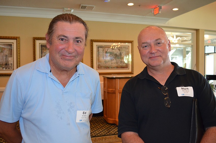 Ed Sabol and Mark Marek chatted before local emergency managers addressed the crowd of more than 100.