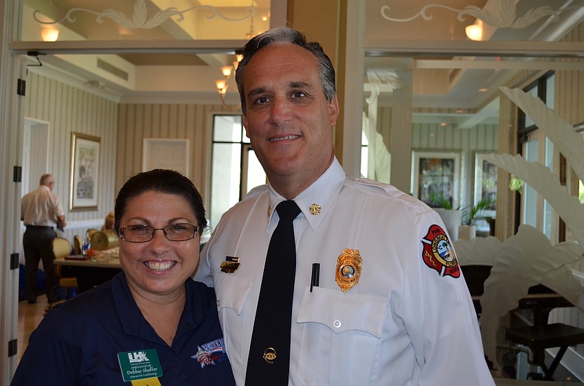 Longboat Key Chamber of Commerce ambassador Debbie Schaffer and Fire Chief Paul Dezzi pose before the seminar.