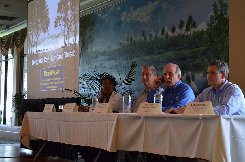 Panelists prepare fr the 14th annual Disaster Preparedness seminar.