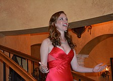 Kathryn Parks opens the entertainment portion of a fundraiser for The Players Centre for the Performing Arts by captivating the crowd with a song.