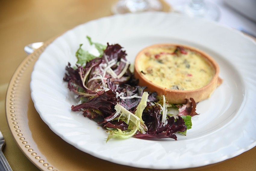 First Course — Roasted vegetable quiche tartlet with mixed greens, champagne vinaigrett paired with Satori Family, Pinot Grigio