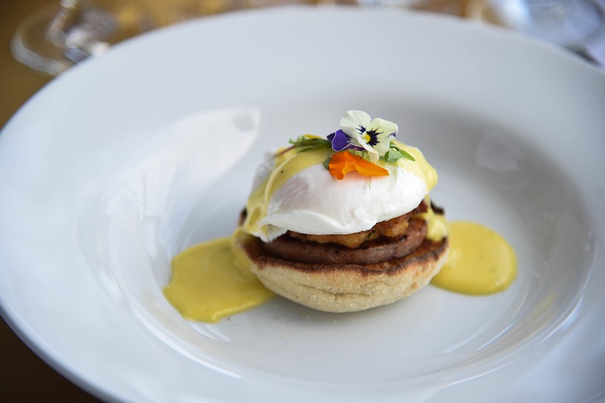 Second Course — Crabcake eggs benedict with tangerine habanero hollandaise sauce paired with Veuve du Vernay Brut Rose