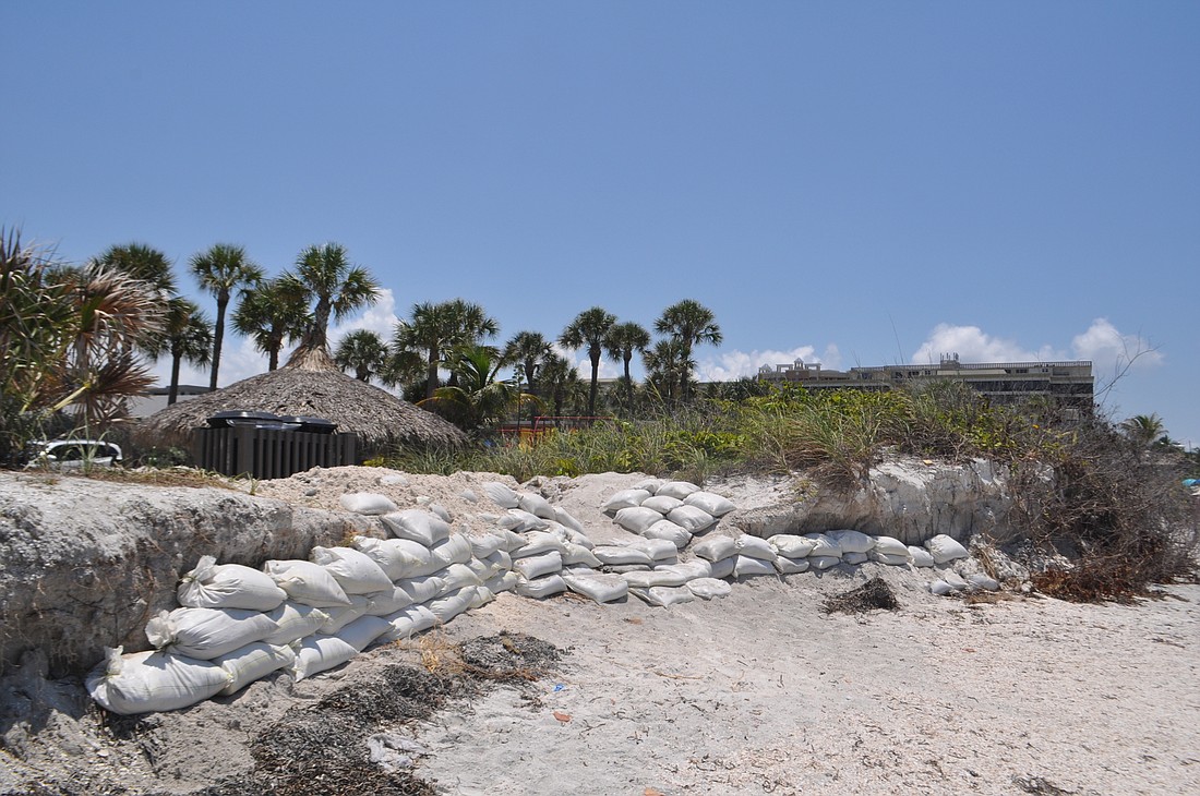 The Suntide Island Beach Club brought in sandbags to enhance the dunes during Tropical Storm Colin.