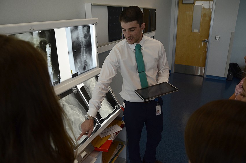 Michael Koski teaches students about x-rays.