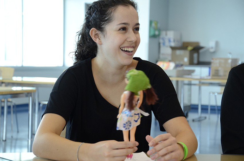 Sammi Zeitt of Lakewood Ranch High School tries to identify the vitamin deficiency of the pirate Barbie.