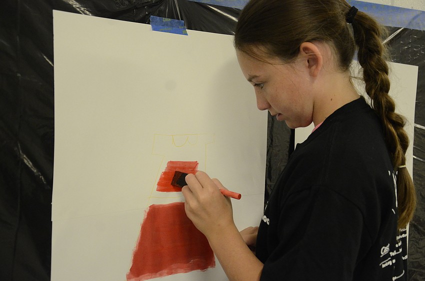 Rylee Little of Palmetto Charter School designs a costume.