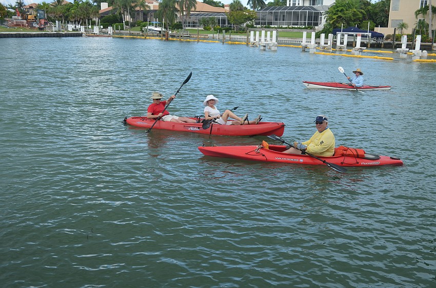 Kayakers enjoy the water after using the lift.