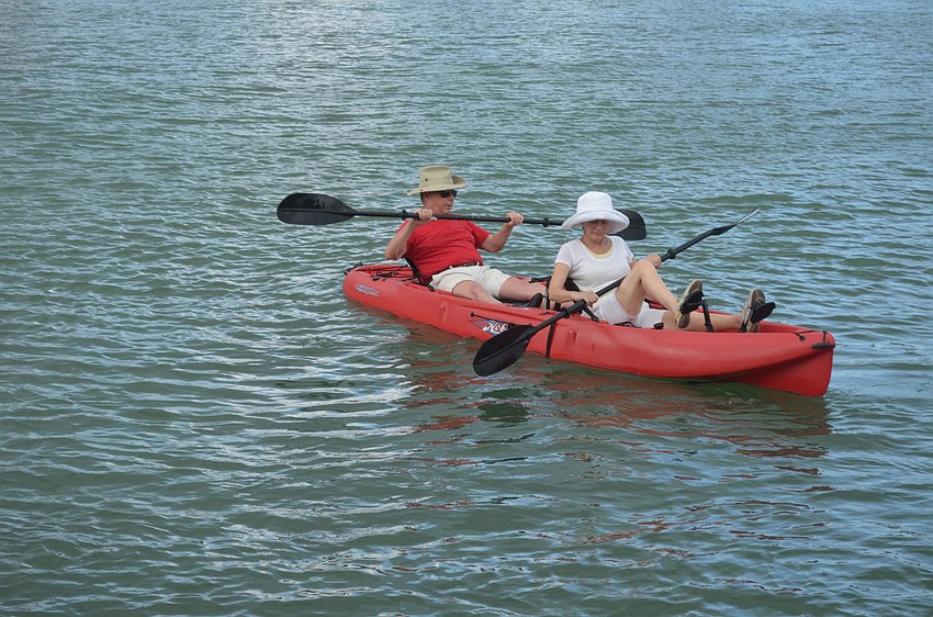 Commodore Lynn Smith, front, and husband, Kendall