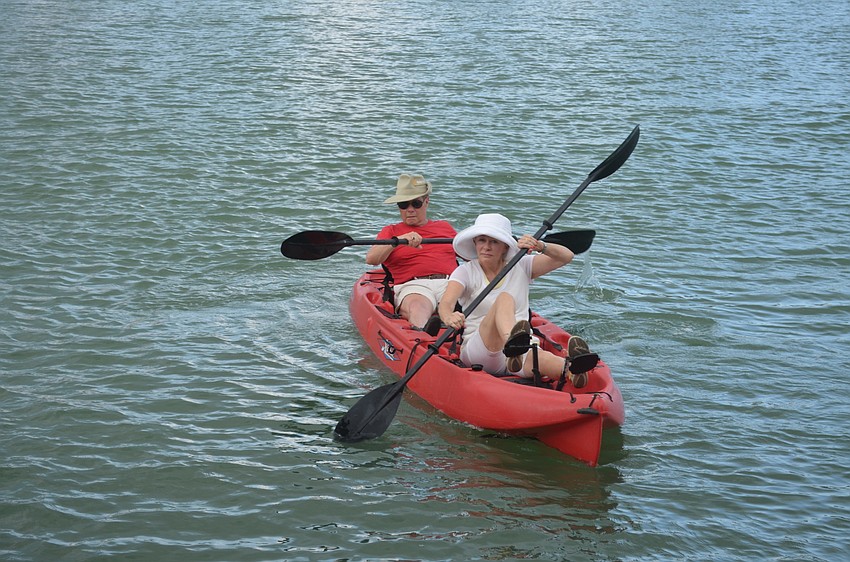 Commodore Lynn Smith, front, and husband, Kendall
