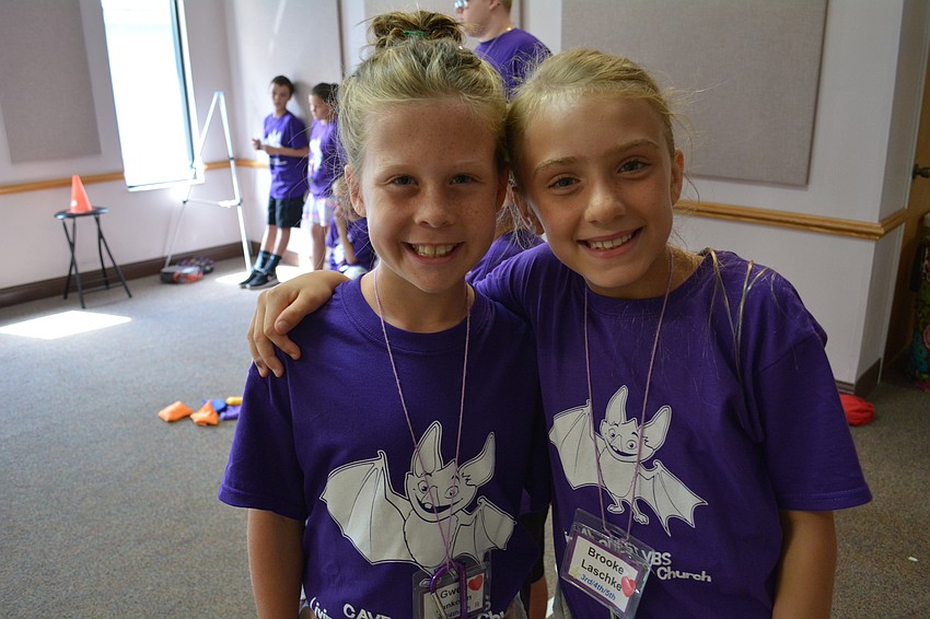 Tara Preserve's Gwen Pankonin hangs out with GreyHawk Landing's Brooke Laschke.