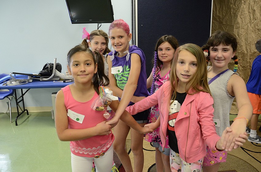 Chloe Fuentes, Marisa Williams, Autumn Wildgrube, Megan Bovaird, Kaitlyn Harper and Ainsley Williams were the first group to get into a circle.