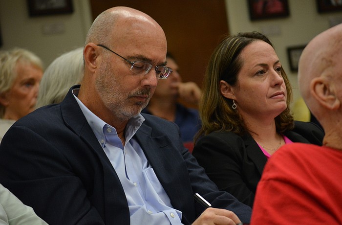 Town Manager Dave Bullock and Town Attorney Maggie Mooney-Portale await the Manatee County Commissionâ€™s decision on the half-cent sales tax.
