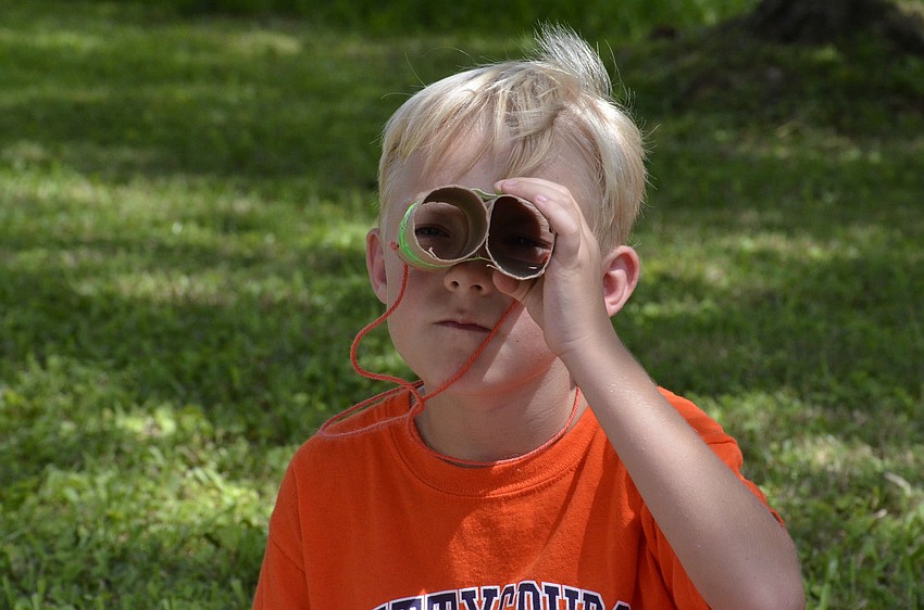 Liam  Christenson sees the world through his toilet paper binoculars.