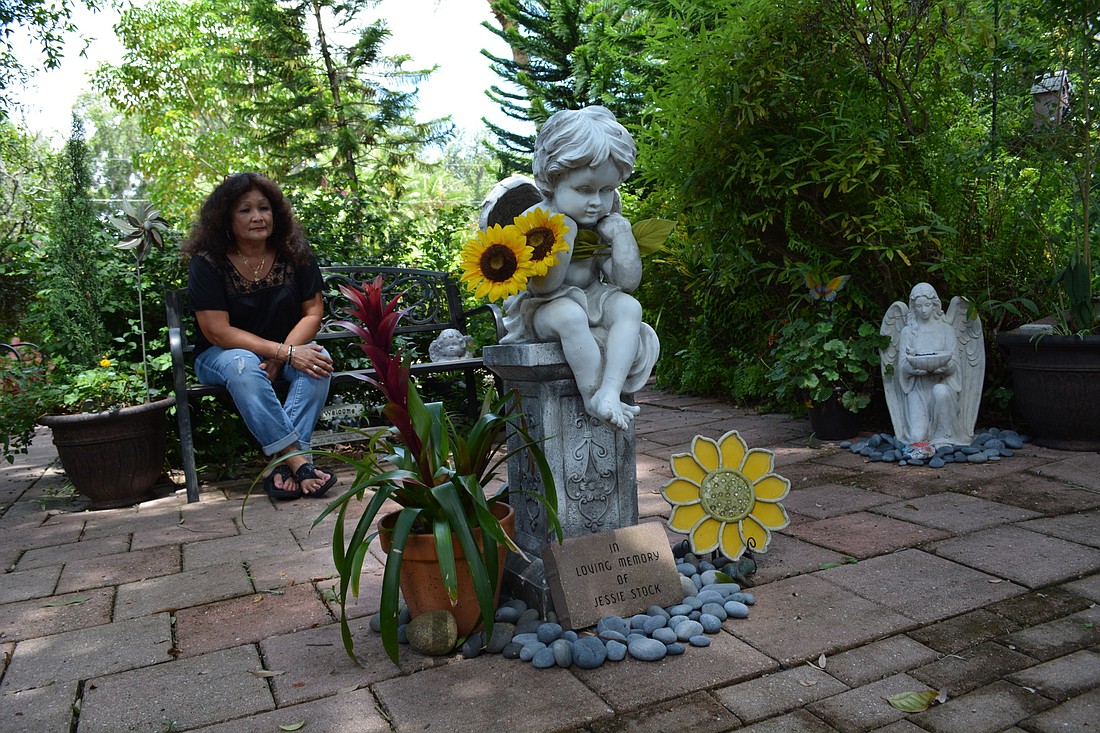 Rose Stock says she prays and thinks of her daughter every day while walking through the garden built in her memory. The garden has been part of Stock's grieving process.
