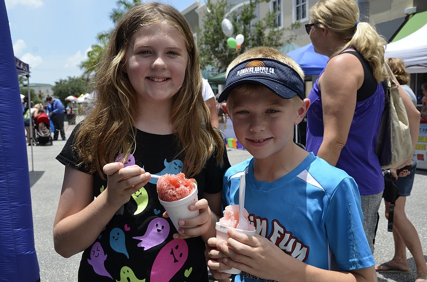 Reagan and Charlie Wilson cooled off with snow cones.