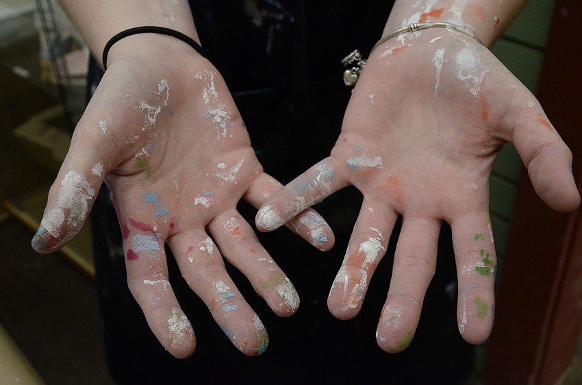 Nikki Williams has gotten used to having paint on her hands.