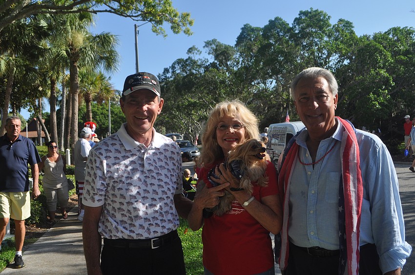 Jim and Lynn Larson with their dog Muffin and friend Andrew Vac