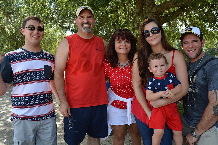 Matthew Brooks stands with Tim and Dawn Davidson and their family, Kalyn, Beau and Corey Petrilla.