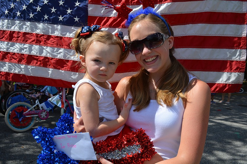 Palmer Hollett, 2, with her sister Brooklyn, took first place for their 