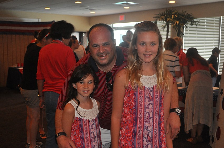 Shaunt and Jennifer Sarkissian, 8, and Chelsea Riedel, 11