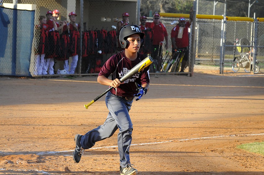 Braden River Junior All-Star Julian Bejarano trots down to first base after getting hit by a pitch.