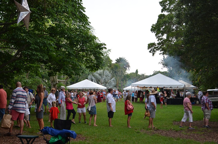 Members and guests enjoyed a barbecue on the lawn at Marie Selby Botanical Gardens to celebrate the Fourth of July.